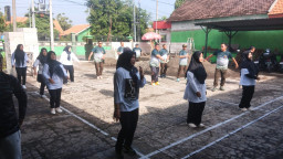 Harmoni Kebugaran dan Kekompakan: Keluarga Besar Koramil 07 Krembung Gelar Senam Bersama untuk Perkuat Silaturahmi