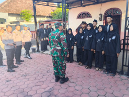 Babinsa Krembung Kawal Pemberangkatan Calon Warga PSHT, Wujud Pembinaan dan Sinergi untuk Ketertiban