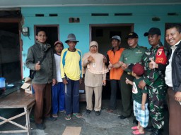 Tim Sergab dari Koramil 0816/06 laksanakan serapan gabah petani