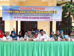 Danramil 07/Krembung Ikut Menyambut Team Evaluasi Perkembangan Desa di Desa Gading Kec. Krembung.