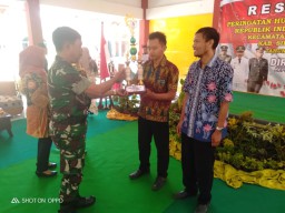 Bati Tuud Koramil 0816/13 mewakili Danramil, menghadiri resepsi peringatan Hari Ulang Tahun HUT ke - 74