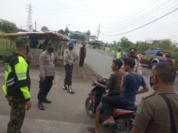 Tetap Waspada Covid-19, Tim Satgas Kecamatan Tarik Laksanakan Razia Masker dan Mensosialisasikan 3m
