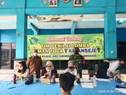 Koramil 0816/07 Krembung Serka Awwabin Laksanakan Pendampingan Pembagian Kartu BPNT.