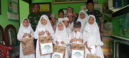 DANRAMIL 0816/16 WARU MEMBERIKAN SANTUNAN KEPADA ANAK YATIM.