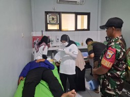 Sentuhan Humanis Kodim 0816/Sidoarjo: Kawal Ketat Warga dalam Screening Katarak HJK Kodam V/Brawijaya