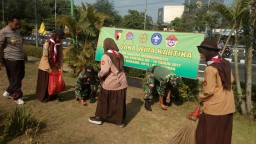 PERINGATI HUT KE 10 SAKA WIRA KARTIKA KORAMIL 0816/16 WARU MELAKSANAKAN KARYA BHAKTI DI TPU DESA JANTI WARU SIDOARJO