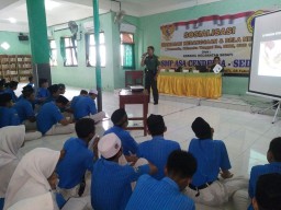PERAN SERTA BABINSA KORAMIL 0816/18 SEDATI MEMBINA SIKAP NASIONALISSME DI SEKOLAH