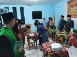 Danramil 0816/13 Wonoayu Yang di wakili Bati Tuud Hadiri Acara Pelantikan dan Bimtek Pengawas TPS Kecamatan Wonoayu