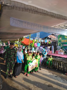 Babinsa Ramil 0816/11 Tarik kawal Karnafal TPQ Irsyadul Kafi