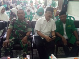Anggota Koramil 0816/05 Tulangan dan Forkopimka hadiri Pelantikan GP Ansor Tulangan