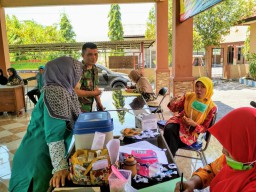 Peran Babinsa Buduran Dampingi Posyandu di Desa Binaannya