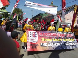 Babinsa 0816/03 Buduran laksanakan pengamanan kegiatan gerak jalan