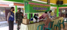 Pendistribusian kartu perluasan program sembako selama pandemi covid 19 tiga Desa di Desa Watugolong Kecamatan Krian
