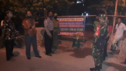 Jaga check point Covid-19, Babinsa 12/Prambon dan Babinkamtibmas bersinergi