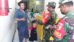 Cegah virus covid 19 Koramil 0816/05 Tulangan bagikan masker gratis