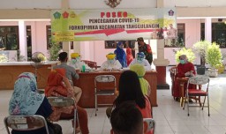 Babinsa Koramil 0816/06 Tanggulangin melaksanakan giat Pendampingan Rapidtest Gratis