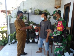 Kodim 0816/SDA Kerahkan Babinsa untuk Distribusikan Obat Gratis bagi Pasien Isoman