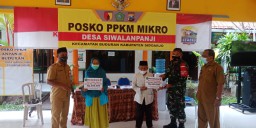 BABINSA 0816/03 BUDURAN MELAKSANAKAN PENDAMPINGAN PENYALURAN BLT - DD