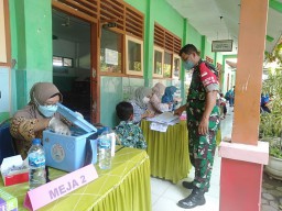 Puskesmas Bersama Koramil 08/Jabon Laksanakan Vaksin Covid Usia 6-11 Tahun
