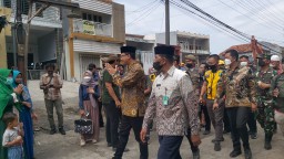 Danramil 0816/03 Buduran beserta anggota melaksanakan pendampingan pembebasan lahan