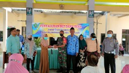 Pastikan Berjalan Lancar, Babinsa Ramil 0816/13 Dampingi Penyaluran BLT Dana Desa