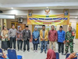 Anggota Babinsa Koramil 0816/06 Tanggulangin Sertu Catur Wahyu Hadiri Undangan Pelantikan Mutasi Jabatan Pemdes Boro