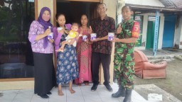 Babinsa Koramil 0816/13 Hadir Dalam Pemberian Makan Tambahan PMT Untuk Balita.