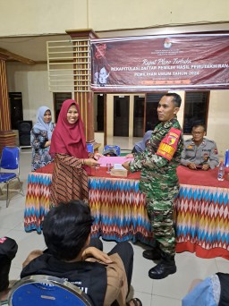 Babinsa Koramil 0816/11 Tarik Hadiri Rapat Pleno Terbuka Rekapitulasi Daftar Pemilih Hasil Pemutakhiran DPHP