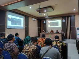 Babinsa Koramil 0816/05 Tulangan Hadiri Lokakarya Mini Lintas Sektor Puskesmas Kepadangan.