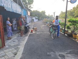 Masyarakat Desa Penambangan Sambut Gembira Peningkatan Paving Jalan dari Program TMMD