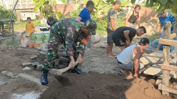 Karya Bakti Sinergi Warga dan Koramil 0816/17 Gedangan dalam Pembangunan Infrastruktur Jalan dan Saluran Air