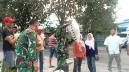 Babinsa Koramil 0816/03 Buduran Dukung Ketahanan Pangan, Dampingi Langsung Serapan Gabah Petani