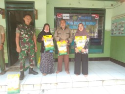 Gerakan Pangan Murah di Prambon, Koramil 0816/12 Prambon Salurkan 200 Sak Beras SPHP untuk Ringankan Beban Warga