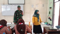 Babinsa Dampingi Pendistribusian MBG: Pastikan Anak Sekolah Terima Gizi Seimbang