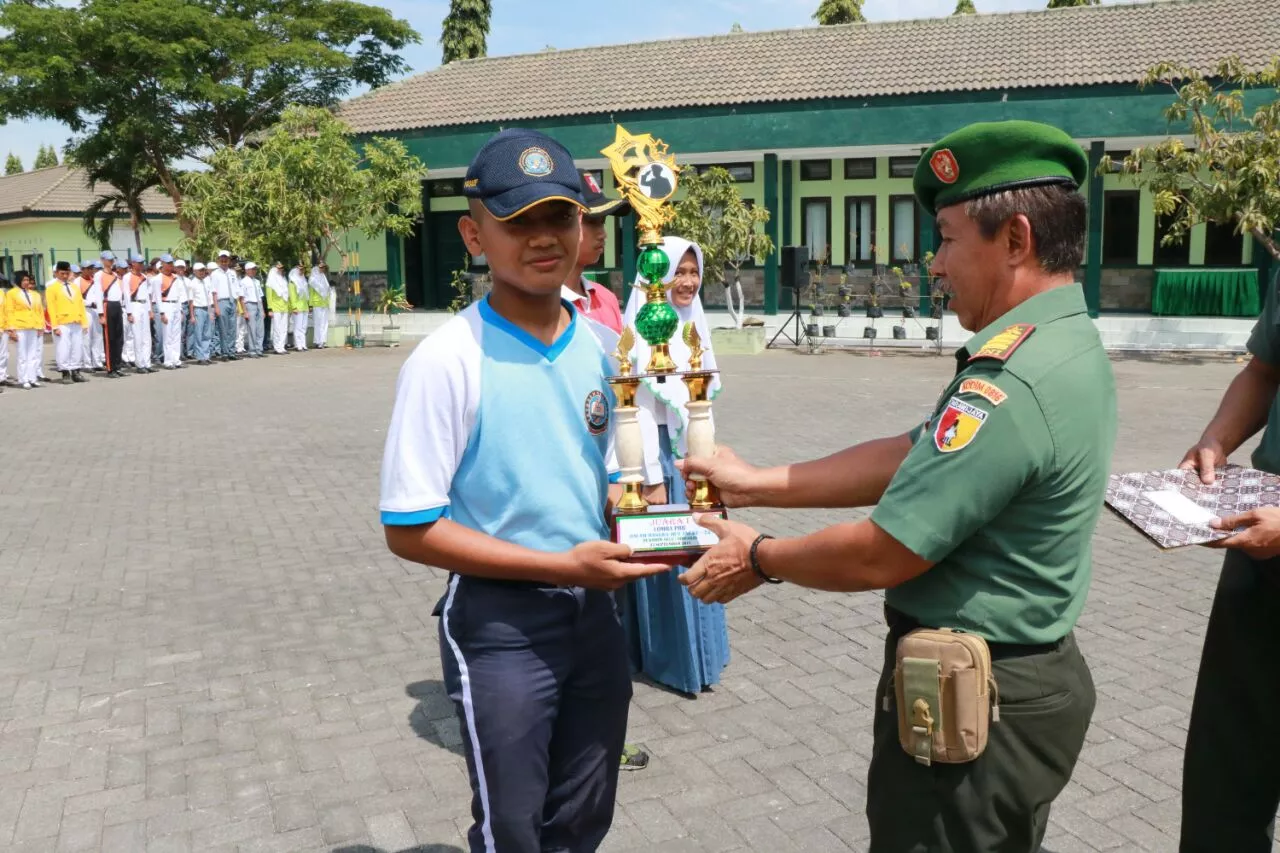 SMA HANG TUAH 5 CANDI SABET JUARA PERTAMA PBB TINGKAT SMA HUT TNI KE 72 KODIM 0816/SDA