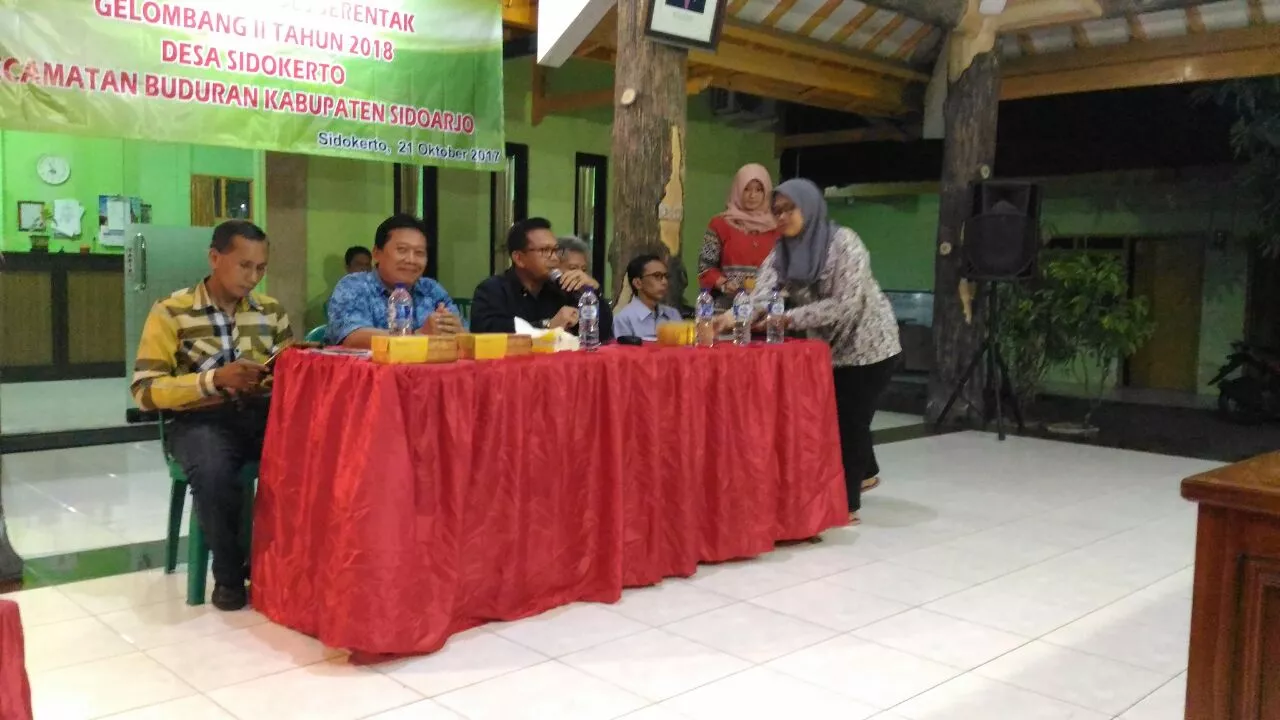 BABINSA DESA SIDOKERTO KORAMIL 0816/03 BUDURAN MENGHADIRI SOSIALISASI PILKADES
