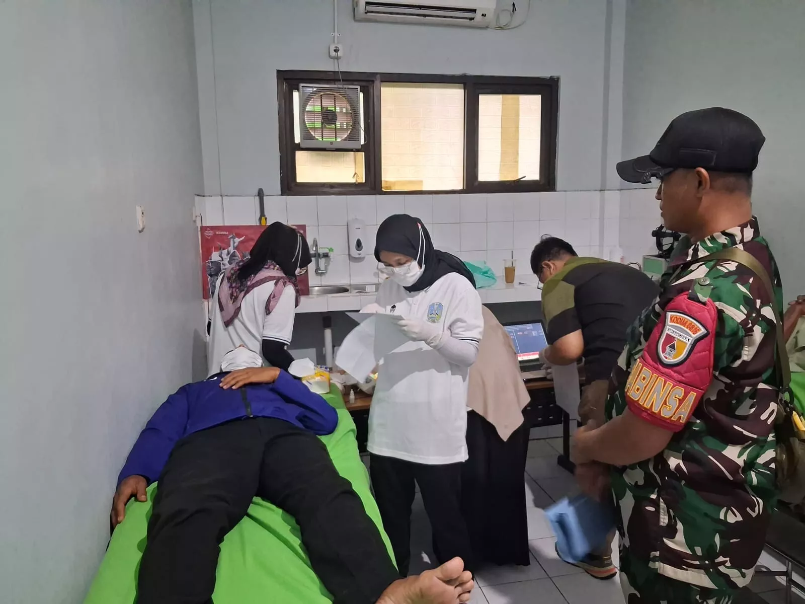 Sentuhan Humanis Kodim 0816/Sidoarjo: Kawal Ketat Warga dalam Screening Katarak HJK Kodam V/Brawijaya